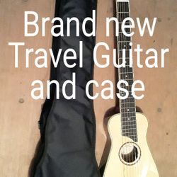 Brand New Travel Guitar And Case 