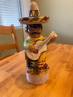 Vintage signed 1967 tequila mariachi player ceramic decanter.  13x5 inch. Southwest decor.