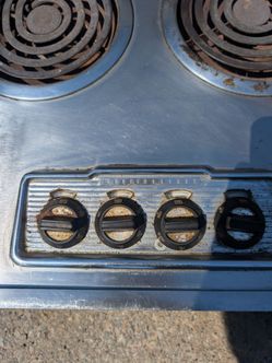 Vintage Westinghouse cooktop mid-century with a Nutone range hood