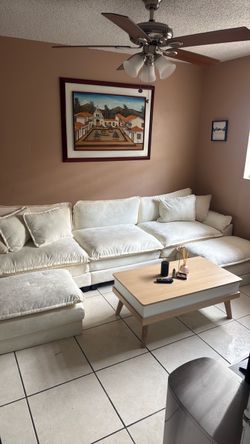 Cream u-shaped couch