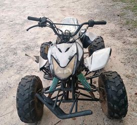 125cc 4wheeler no specific brand it's called a Cooster