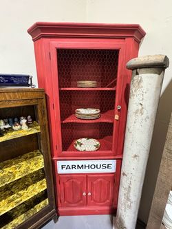 Red Farmhouse Corner Cabinet with Chicken Wire Door