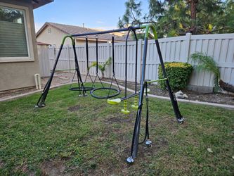 Swing set with tie downs