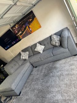 * Like New * Ashley Furniture 2pc Modular gray sectional sofa ( Free Delivery )