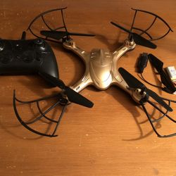 drone incudes remote battery and charger 