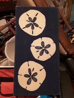 Cloth picture of sand dollars