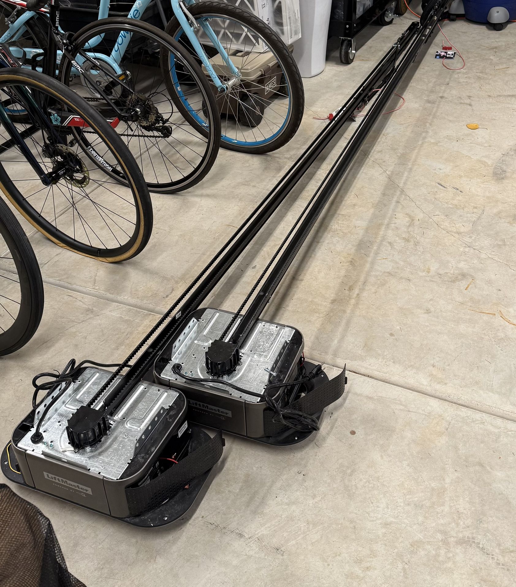 2 Liftmaster garage door operators 87504R-267MC with 8’ rail.