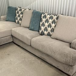 Ashley® Bardarson 2-Piece Silver Left-Arm Facing Loveseat Sectional and Chaise  With Decorative Pillows  