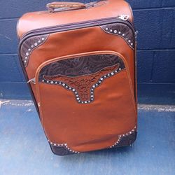 Montana West western tooling embossed vegan leather spinner wheels suitcase.