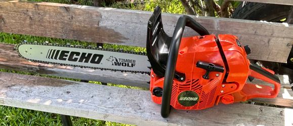 $300$. 24 in. 59.8 cc Gas 2-Stroke Rear Handle Timber Wolf Chainsaw