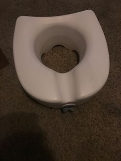 Toilet seat raiser