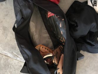 Batting bag set. Comes with a bat, 4 gloves, balls, and some extra gear. Asking for $40.