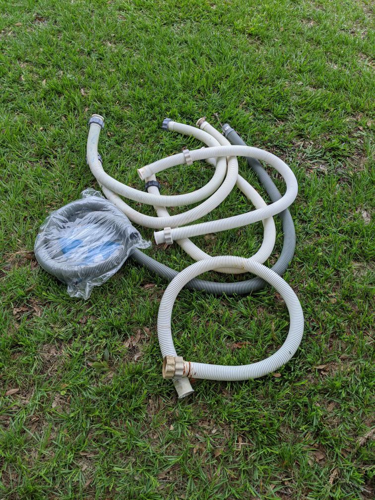A bunch of pool hoses