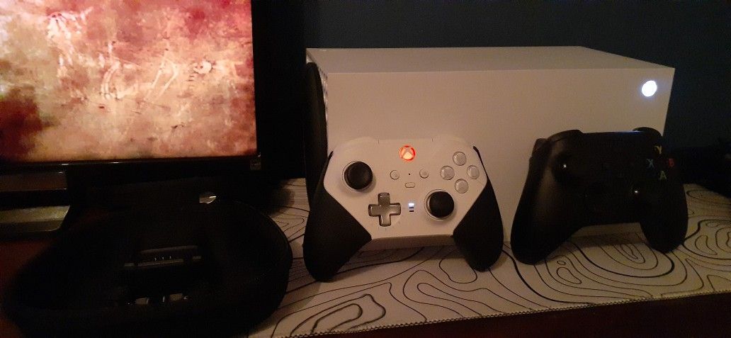 Xbox Series X and 4 controllers And Gaming Chair