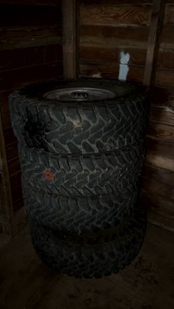 $650 OBO / Toyo Open Country M/T 31x10.50R15LT Tires on Mazda Wheels