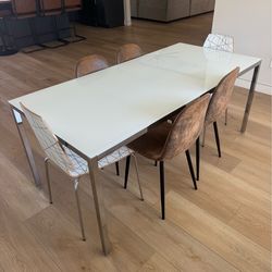Glass dining table and 6 chairs