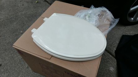 Oval Toilet seat. Bone. Wood.