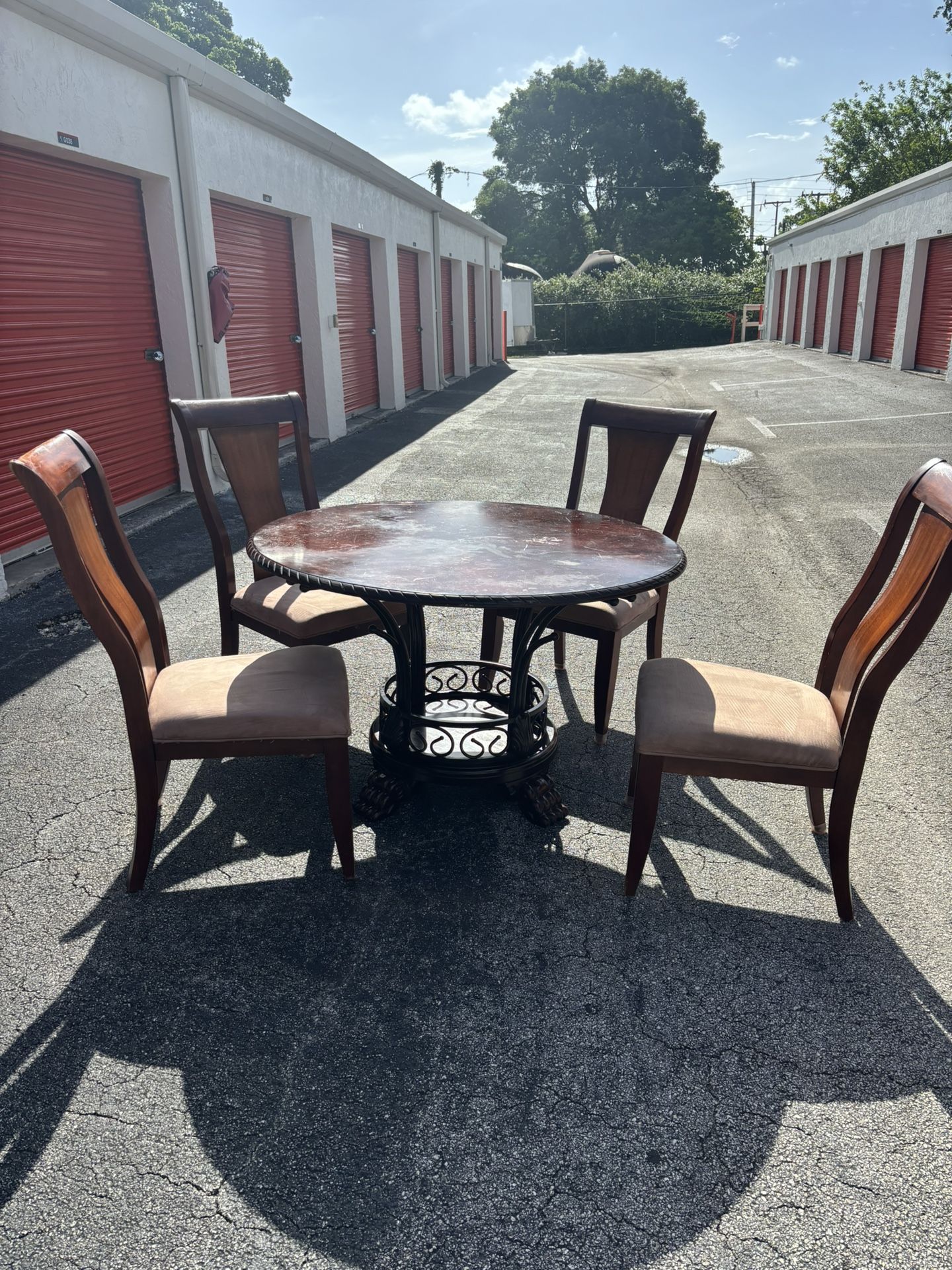 Round Wood/Metal dining table and 4 Wood chairs