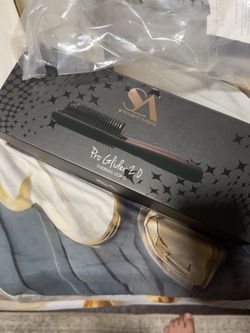 Heated styling comb