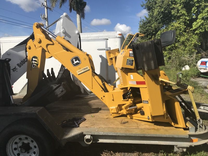 John Deere 911 extenda hoe skid steer backhoe attachment