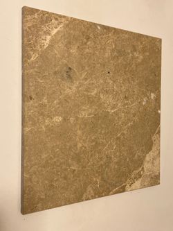 Unused polished tile. 40 12” in