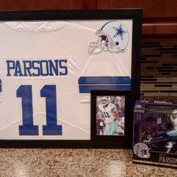MICAH PARSONS OF THE DALLAS COWBOYS CUSTOM STITCHED FRAMED JERSEY WITH ACTION FIGURE.