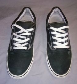 Classic solid black Vans