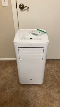 GE 6100 BTU PORTABLE AIR CONDITIONER W/ DEHUMIDIFIER & REMOTR