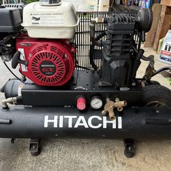 Hitachi dual tank gas powered compressor.
