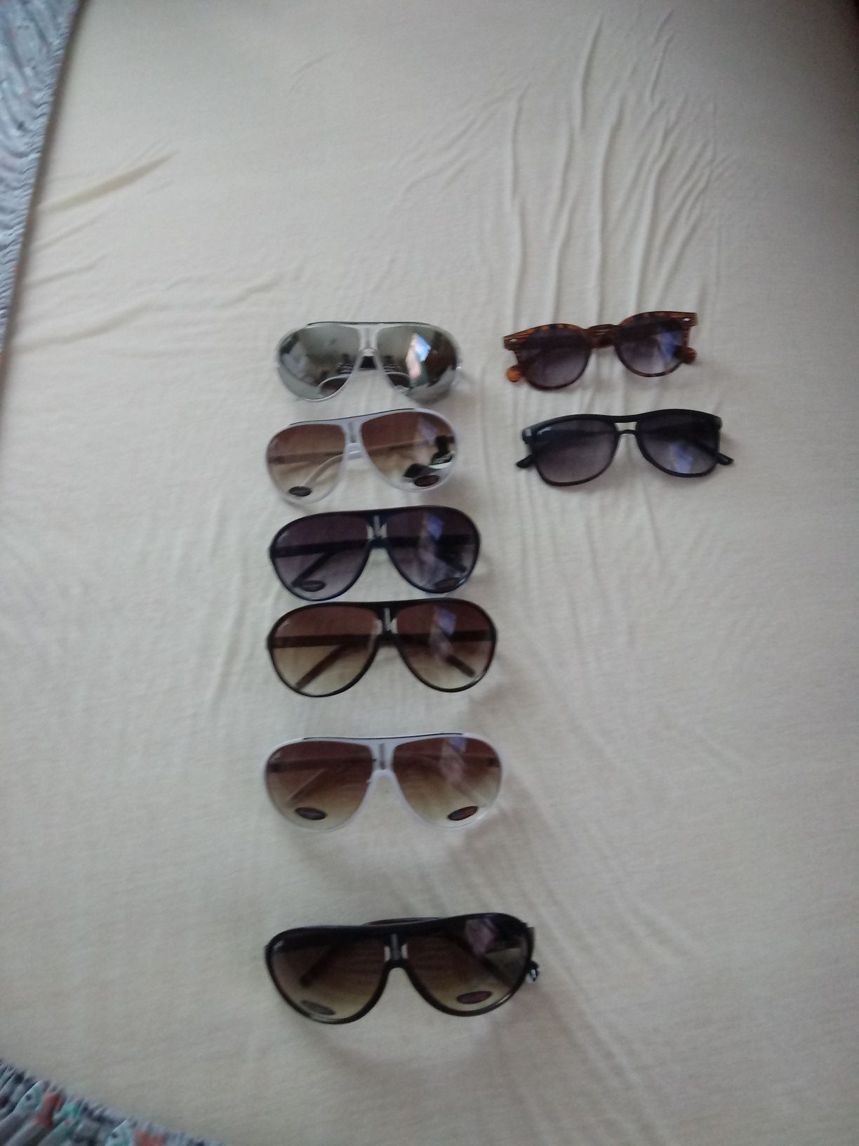 8 pair of Sun glasses brand new they go for 12.99 a piece but selling for less