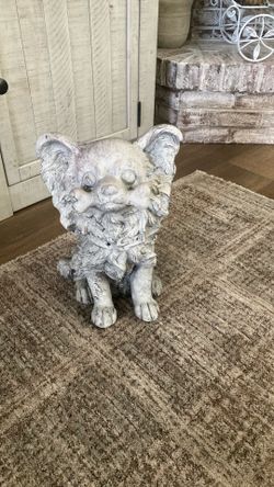Long haired dog statue! Rosedale area