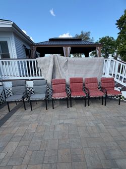 6 Patio chairs with reversible cushions
