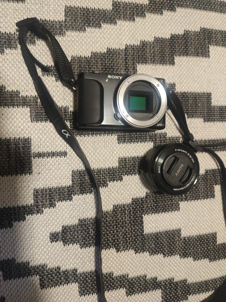 model no. nex-en sony camera camera only with battery And Lense