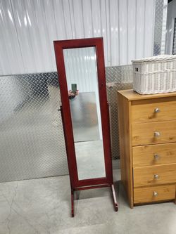 Jewelry storage mirror
