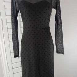 BLACK LONG SLEEBE  SHEER SLEEVES AND UPPER  PORTION OF THE DRESS  Xs  Bodice Has Pokadot  Look  76% Polyestet 20 % Rayo  4 %spandex. The Limited.     