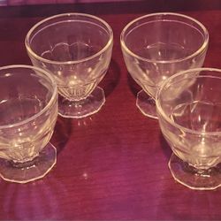 Vintage glass dessert bowls, ideal for serving ice cream, puddings, fruit salads, or other small desserts. 