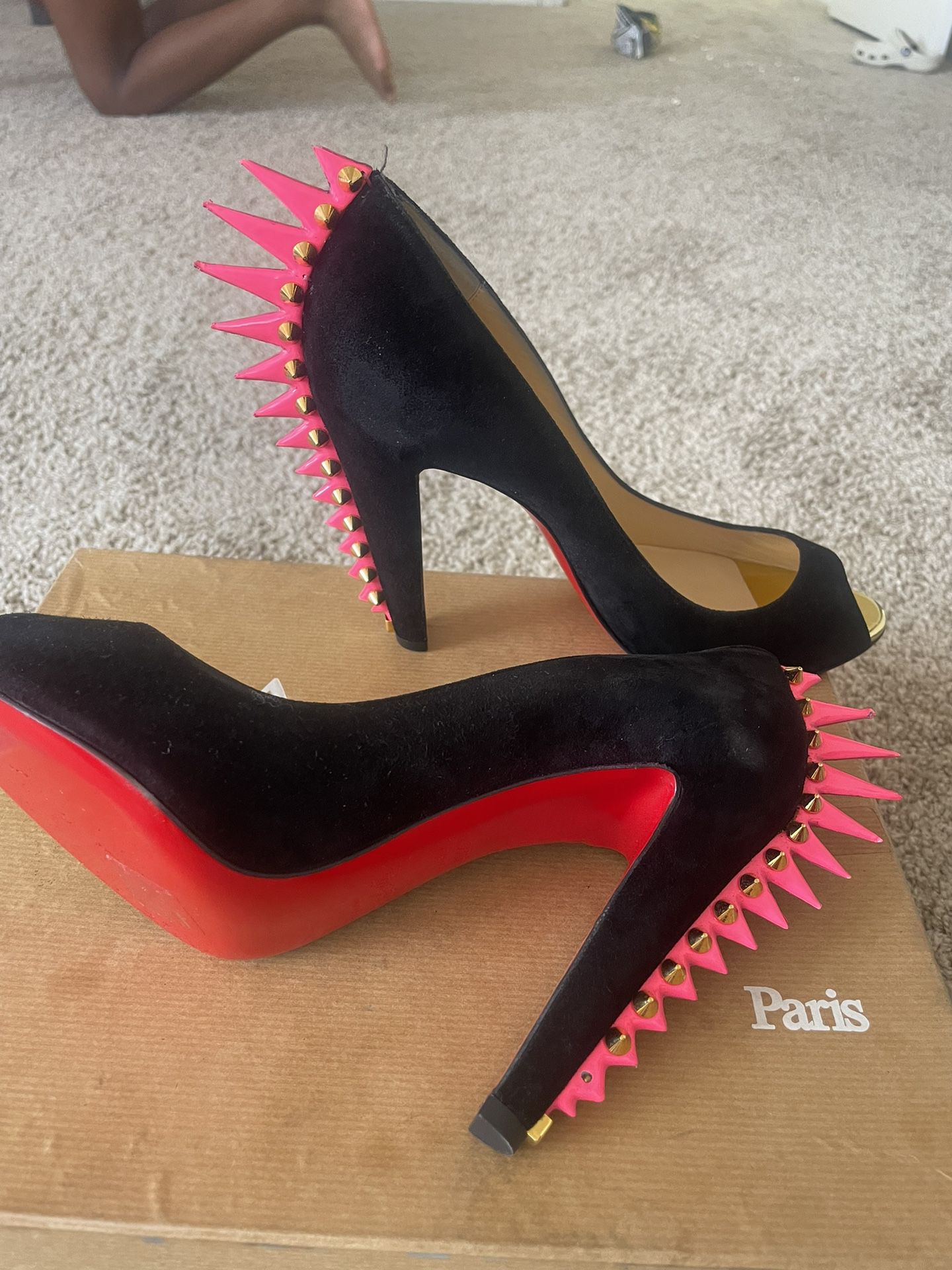 Christian Louboutin (Red bottoms )