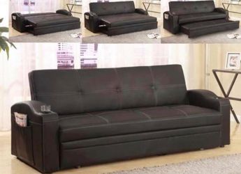 Black leather sleeper sofa with cup holders, brand new . Easy as ordering pizza , ready for immediate drop off