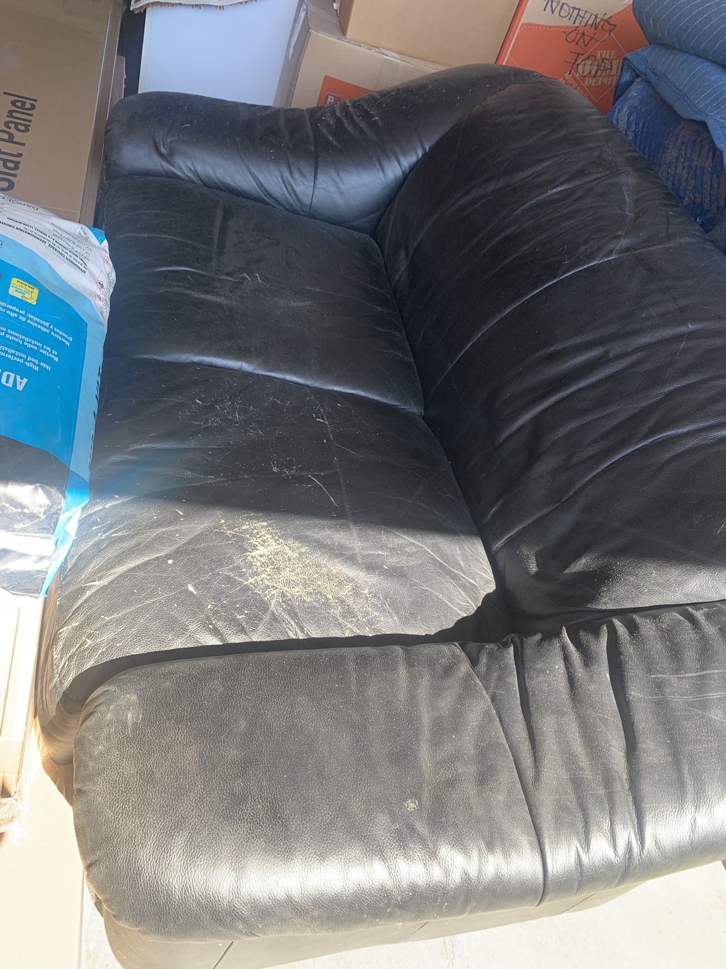 Black Leather Loveseat— loved by dogs