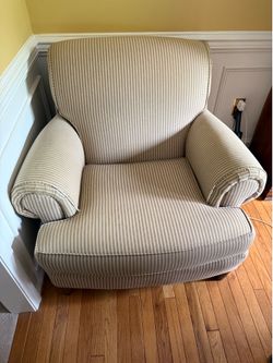 Padded armchair