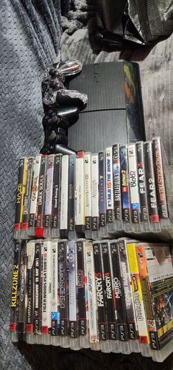 Ps3 with tons of games and controllers