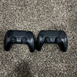 Two Black Ps5 Controllers