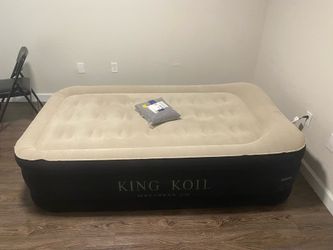 King Koil Air Mattress with unused sheets