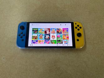Nintendo Switch OLED with 100 Switch Games + 7000 Retro Games