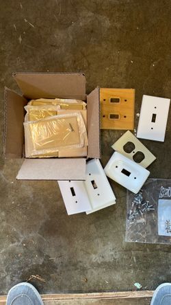 Box of misc switchplates & outlet covers