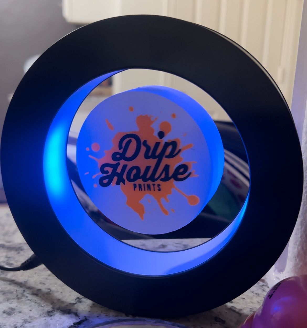 Levitating Brand Logo