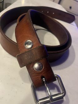 A man’s leather belt