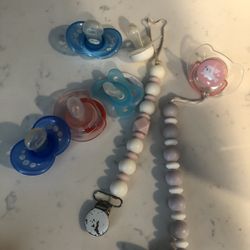 Free. Pacifiers And Holders 
