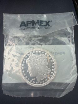 Morgan coin 1 ounce colllectible coins I have seven of them each one $67