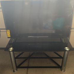 Smart TV TCL 50” Brand New , Never Used and Stand 